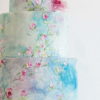 Windswept Blossoms Wedding Cake with Painted Flowers